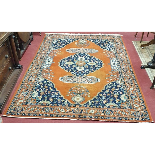 65 - A Rust ground Turkish Wool blend Carpet. 
300 x 200  cm approx.