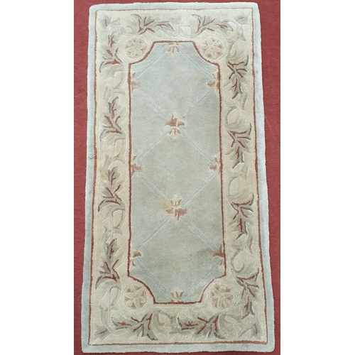 67 - Oriental style Rug. 70 x 37 cm approx.