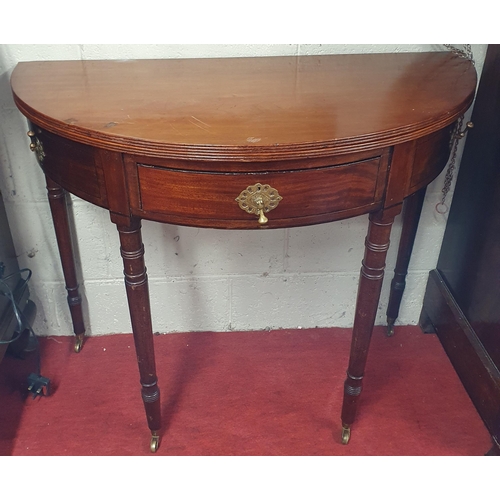 104 - A good 19th Century Mahogany half moon foldover Tea Table with single frieze drawer on turned suppor... 