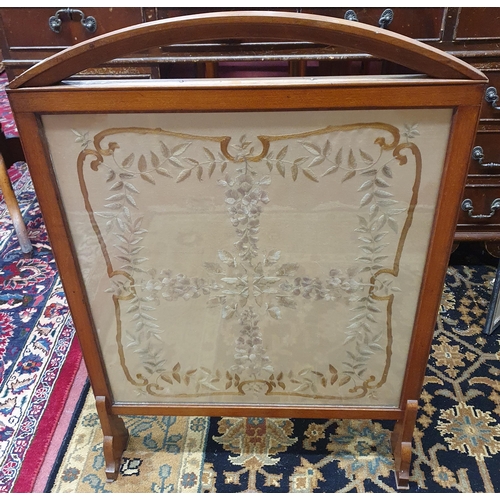 101 - An early 20th Century Fire Screen with needlework panel centre. W 69 x H 82 cm approx.