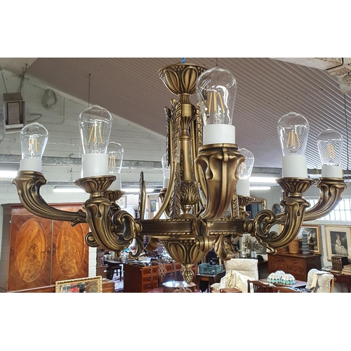 154 - A large Metal eight branch Chandelier.
 H 65 x D 83 cm approx.