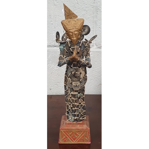 108 - An unusual hand painted Inca style Figure along with an Oriental style figure on a timber base. H 44... 