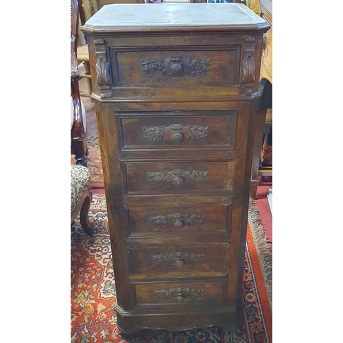 124 - A lovely early to mid 19th Century Walnut and Burr Walnut narrow Cabinet with highly carved front an... 