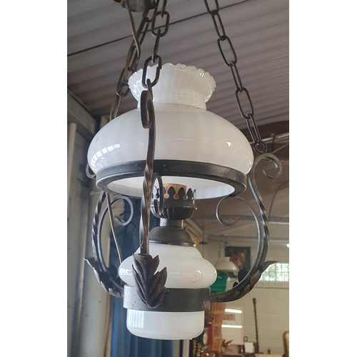 125 - A good Metal and cloudy Glass Hall Lantern. Drop 65 cm approx.