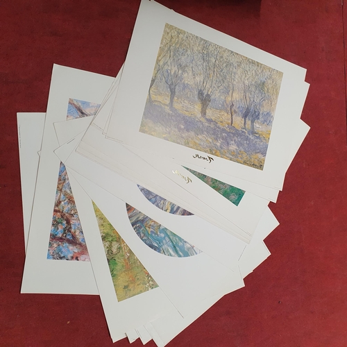 128 - A large collection of unframed coloured Prints after Monet.