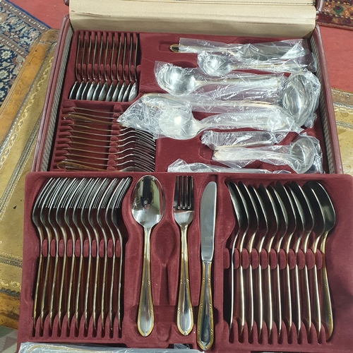 15 - A really good Bestecke Solingen cased Silver Gilt Cutlery Dinner Set.