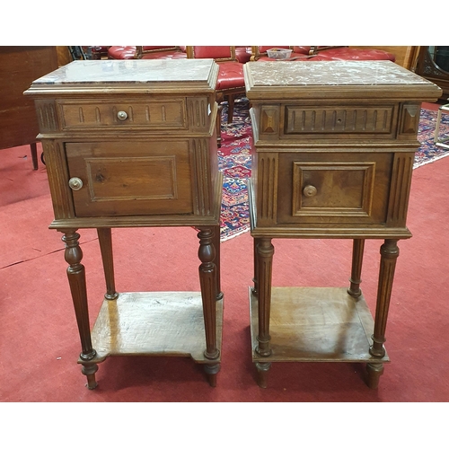 151 - A matched pair of 19th Century Walnut single door Side Cabinets with single frieze drawers on turned... 