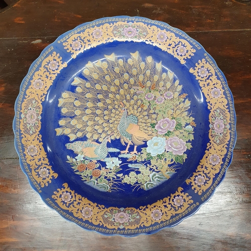 183 - A lovely 20th Century Cloisonne style Centre Dish depicting Peacocks in full display. D 37 cm approx... 