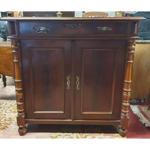 186 - A 19th Century Mahogany twin door Side Cabinet with single frieze drawer on turned columned supports... 