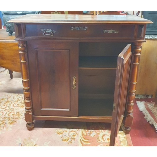 186 - A 19th Century Mahogany twin door Side Cabinet with single frieze drawer on turned columned supports... 