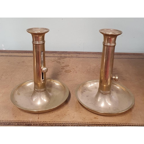 192 - A lovely pair of 19th Century Brass rise and fall Candlesticks. H 17 cm approx.