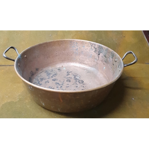 199B - A 19th Century Copper Jam Pan with cast iron handle. D 37 cm approx.