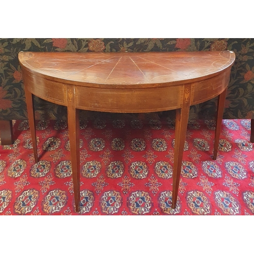 204 - An early Regency Mahogany half moon Table with sunburst top on square tapered supports. 119 x 51 x H... 