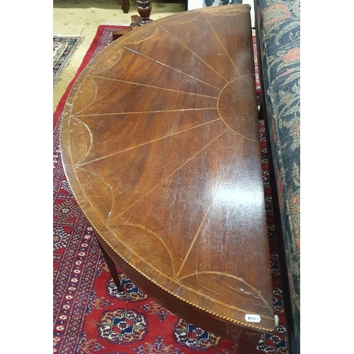 204 - An early Regency Mahogany half moon Table with sunburst top on square tapered supports. 119 x 51 x H... 