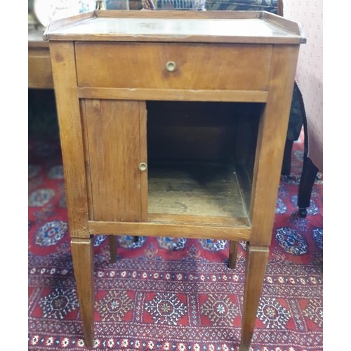 210 - A 19th Century Walnut single door Side Cabinet with single frieze drawer and tambour door base on sq... 