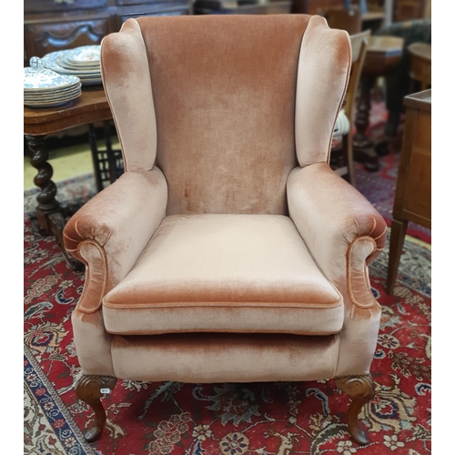 214 - A good 19th Century style Wingback upholstered Chair in pink dralon upholstery. W 81 x SH 48 x BH 10... 