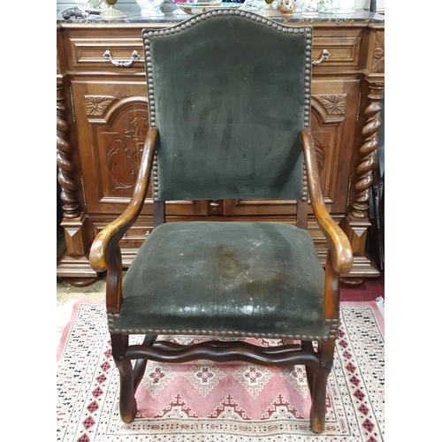 216 - A really good 19th Century Walnut hall Armchair with green dralon upholstery and buttoned back and s... 