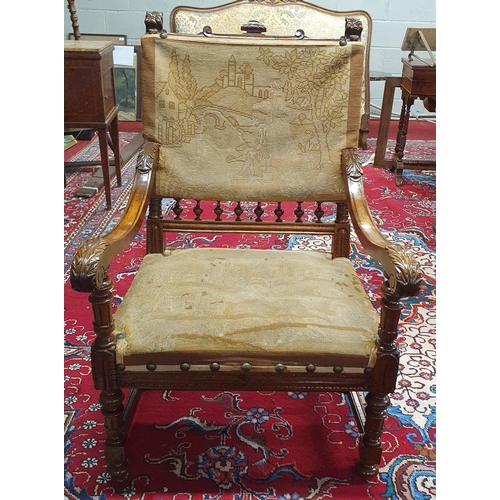 219 - A Fabulous 19th Century Walnut Hall Chair with tapestry upholstered seat and back with carved arms a... 