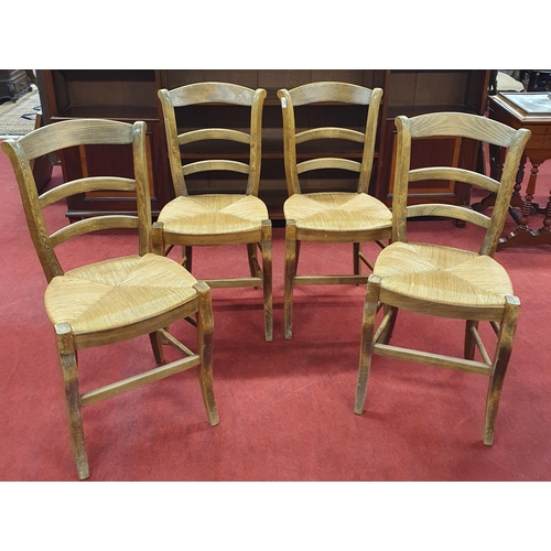 222 - A lovely set of four late 19th early 20th Century provincial Kitchen Chair with rush seats.