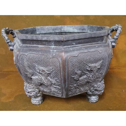 228 - A Fantastic early Oriental extremely heavy Bronze octagonal Cauldron with eight moulded panels on fo... 