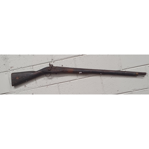 25 - A 19th Century possibly earlier Flintlock single barrelled Rifle.