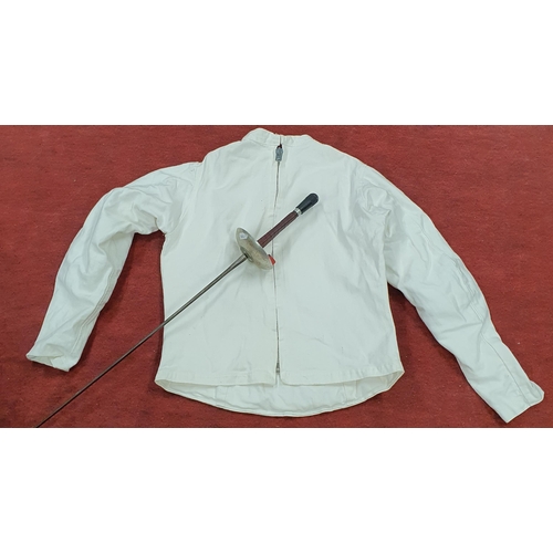 265 - A mid century Fencing Outfit to include a mask, coat and a fencing foil.