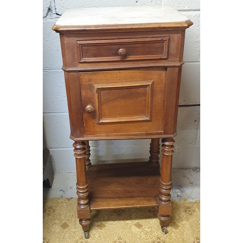 43 - A 19th Century Walnut marble top Side Cabinet with single door and single frieze drawer on turned su... 