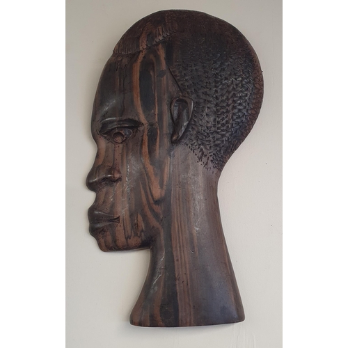 55 - A good quantity of Hardwood figural African Heads.