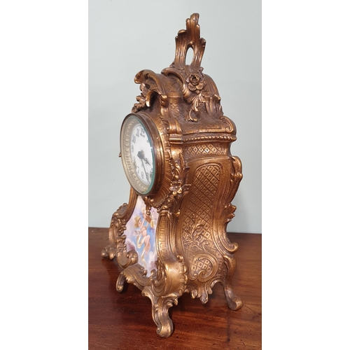 73 - A good Continental Mantel Clock with Sevres style panel base. H 37 cm approx.