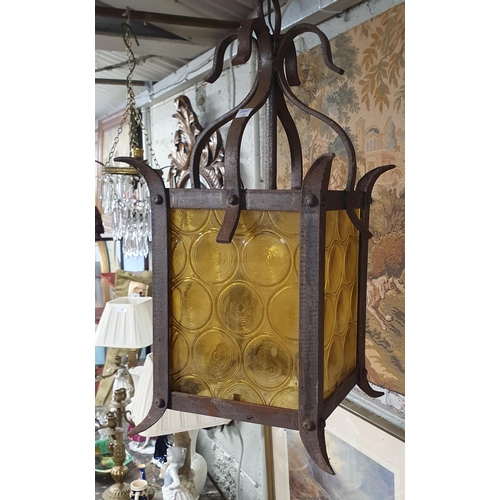 98 - A good heavy Metal and Stained Glass Hall Lantern. Drop 55 x W 18 x 18 cm approx.