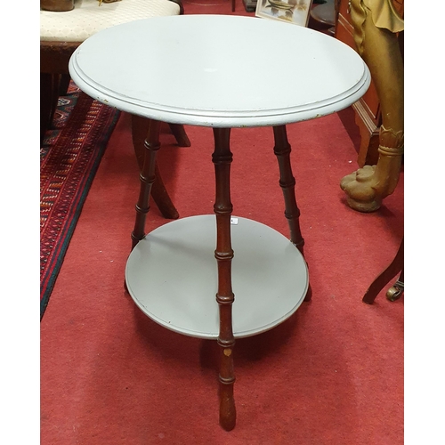 1371 - A late 19th Century circular Wine Table with bamboo style supports and painted top and shelf.
D 41 x... 