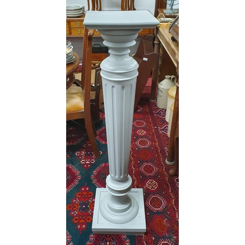 1375 - A late 19th early 20th Century painted Pillar with fluted support on platform base. H 114 cm approx.