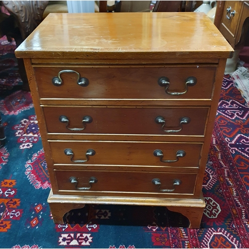 1376 - A miniature Yew Wood Chest of Drawers. W 49 x 33 x H 63 cm approx.