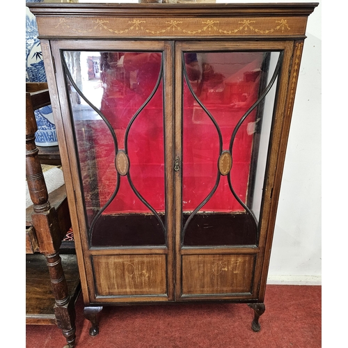 1398A - An Edwardian Mahogany and inlaid display Cabinet.