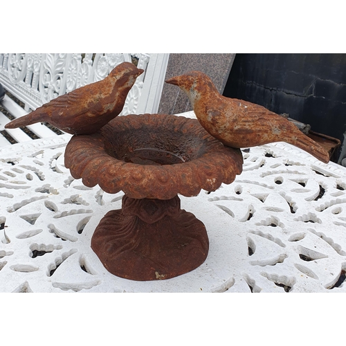 1415 - A Cast Iron bird Bath. H 16 x D 20 cm approx.