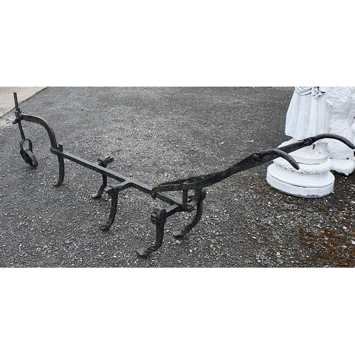 1428 - A 19th Century Cast Iron Plough. 
L 270 x W 54 cm approx.