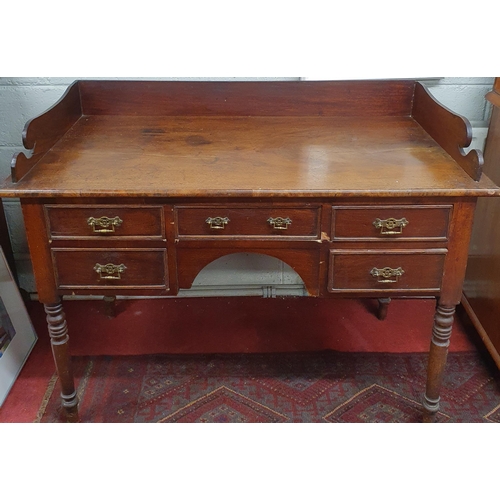 1505 - A 19th Century Mahogany side Table/ dressing Table with knee hole front and gallery back along with ... 