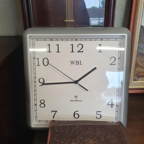 35 - A Kaiser Wall Clock along with a radio controlled wall clock, a family Bible and a quantity of pictu... 