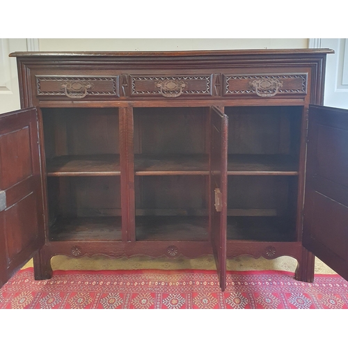 48 - A Fabulous 19th Century Oak three door Side Cabinet with triple frieze drawer with highly carved and... 