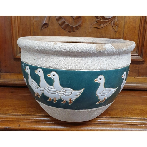 239 - A Terracotta Planter Pot depicting Ducks in a row. D 24 x H 16 cm approx.