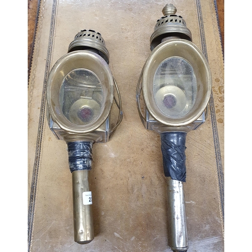 236 - A pair of 19th Century Brass Coaching Lamps.