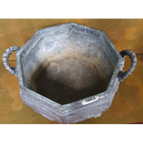 228 - A Fantastic early Oriental extremely heavy Bronze octagonal Cauldron with eight moulded panels on fo... 