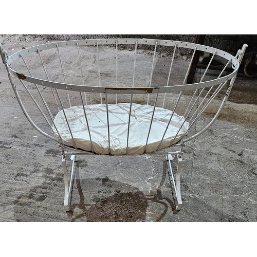 300 - A 19th Century cast Iron Cot. 105 x 53 cm approx.