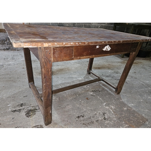 295 - A good 19th Century provincial kitchen Table with side drawer, on square supports and peg joints.