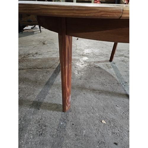 316 - A Pine single leaf Table on square supports.