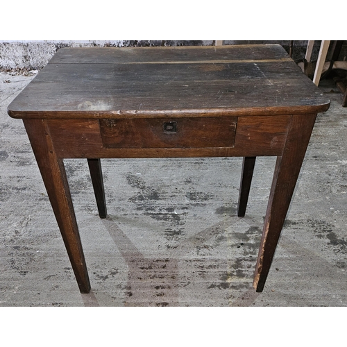 308 - An 18th Century provincial single drawer side Table on square tapered supports.