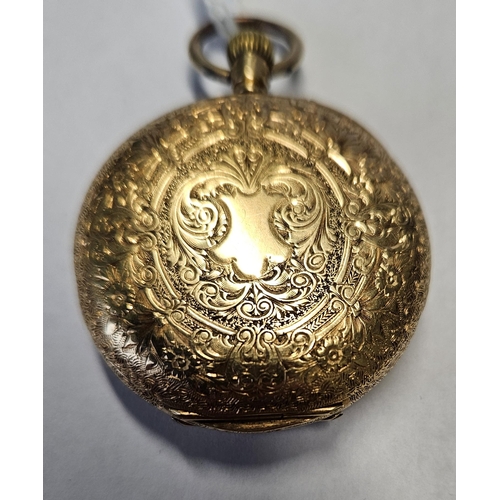 375 - An 18ct Gold fob Watch with a highly etched outline seems to be keeping good time.