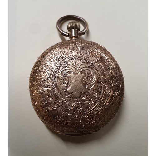 375 - An 18ct Gold fob Watch with a highly etched outline seems to be keeping good time.