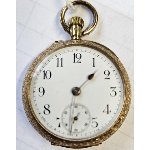 375 - An 18ct Gold fob Watch with a highly etched outline seems to be keeping good time.