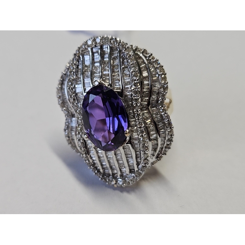 373 - A large 14ct Gold, Diamond and Amethyst Ring, size M.